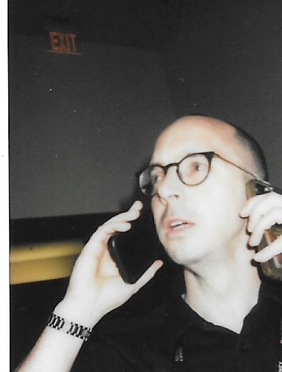 The producer on two phones