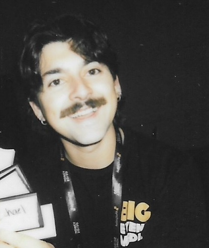 Steven holding speaker cards