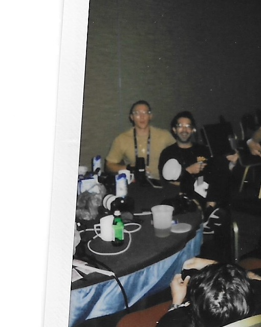 The team and attendees at the tables