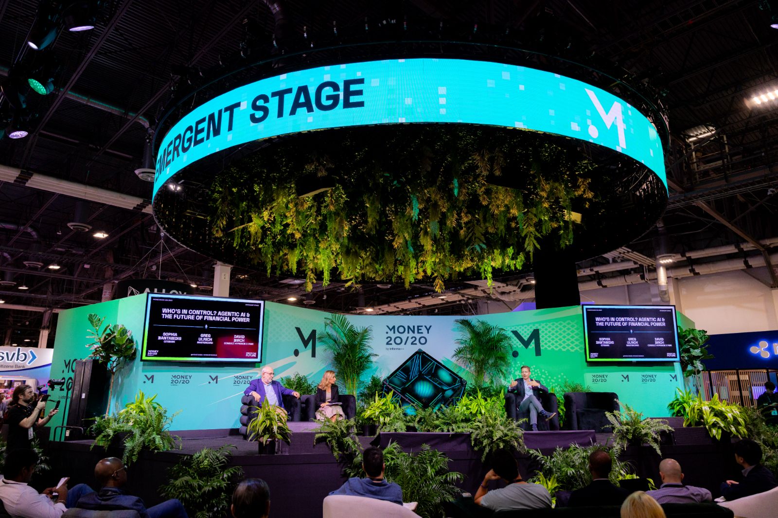 Emergent Stage with hanging plants and turquoise LED ring